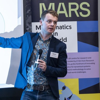 Henry Moss speaking at a MARS event